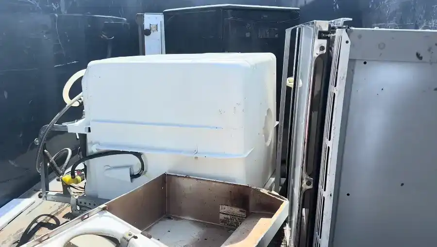 A loaded appliance secured in the truck bed, ready for haul-away