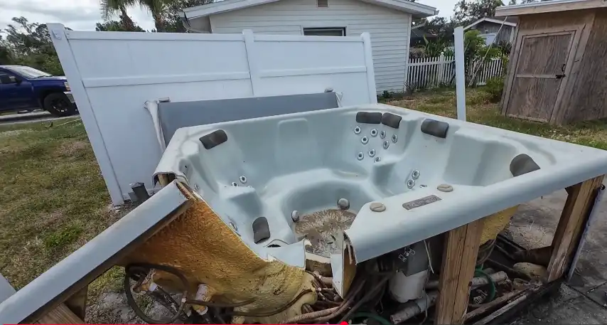 Hot tub removal Redding CA crew dismantling an old spa