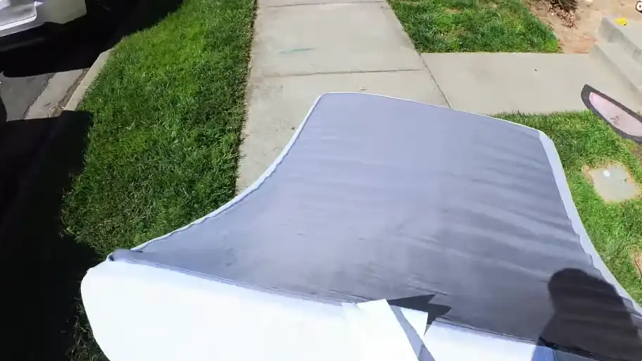 Mattress removal Redding CA — team hauling an old mattress for disposal